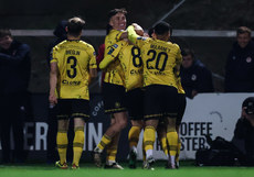 Chris Forrester celebrates after scoring his side's first goal of the match with Joe Redmond and Jake Mulraney 14/10/2024