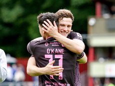 Ryan O'Kane celebrates after the game with Jamie Gullan 3/6/2024