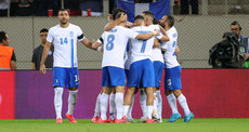 Anastasios Bakasetas celebrates scoring his sides first goal with teammates 13/10/2024