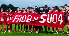 Sligo Rovers players and supporters with a banner after the game 28/6/2024