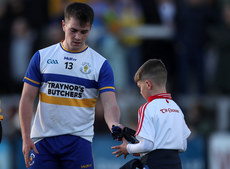 Ruairi Canavan gives a young supporter their gloves at the end of the game 10/11/2024