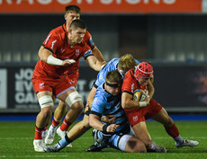 Mike Lowry tackled by Evan Lloyd and Josh McNally 26/10/2024