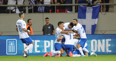 Anastasios Bakasetas celebrates scoring his sides first goal with teammates 13/10/2024