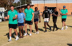 Jordan Larmour and Josh van der Flier with members of the team 3/7/2024