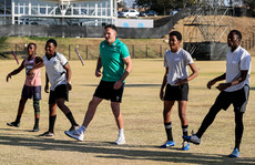 Jacob Stockdale with members of the team 3/7/2024