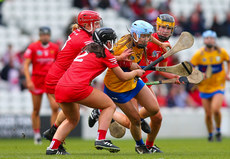 Caoimhe Cahill is surrounded by Cork players 28/4/2024