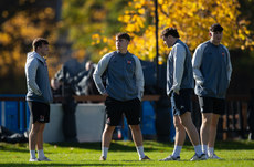 The Queens players inspect the pitch ahead of the game 19/10/2024